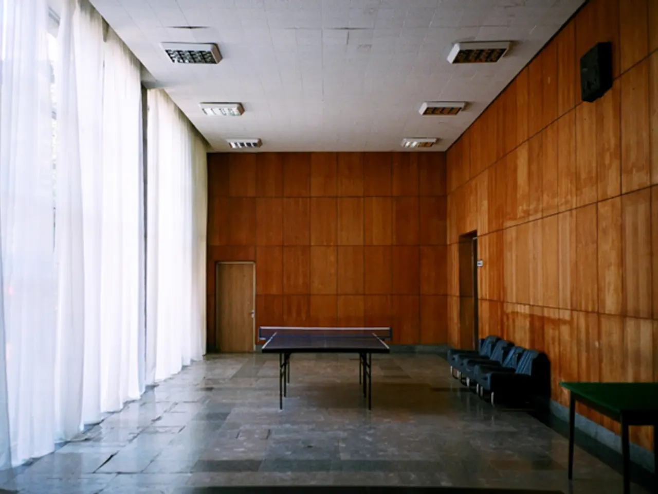 Intruders gain entry into a tennis club, an unwelcomed intrusion causing disruption.