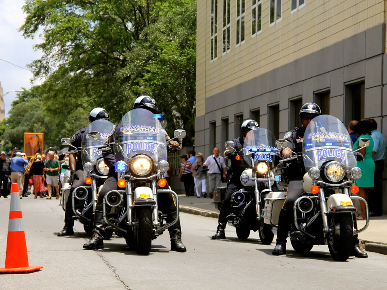 Police motorcycle pursuit ends with evasive driver hiding in a wooded area