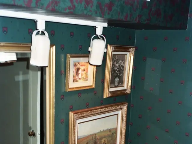 Ignoring the common advice of using neutral colors in small spaces, this captivating bathroom...