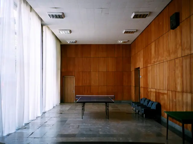 Intruders gain entry into a tennis club, an unwelcomed intrusion causing disruption.