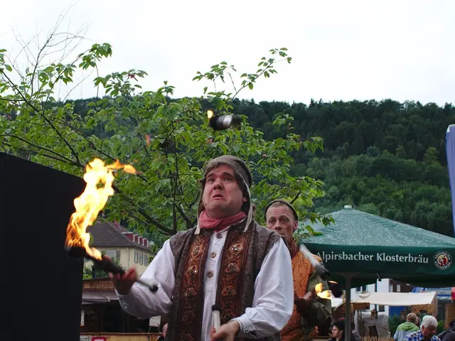 Fire erupts on the rooftop of a downtown pub