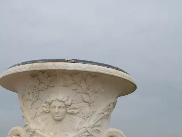 In this image there is sculpture in the background there are people standing and there are...