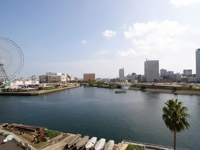 In this image we can see sky with clouds, buildings, skyscrapers, trees, bushes, giant wheel, fun...